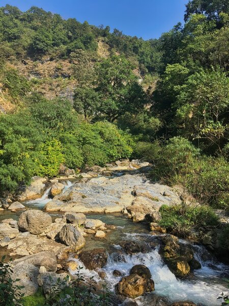 The Rispana river shortly before it descends into the gorge. The path upstream leads to a village called Talainigad.