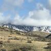 Red Tail trail 71, heading north after crossing Sage Creek Drive. Hills to the north are the Stack Rock Preserve after an early snowfall.