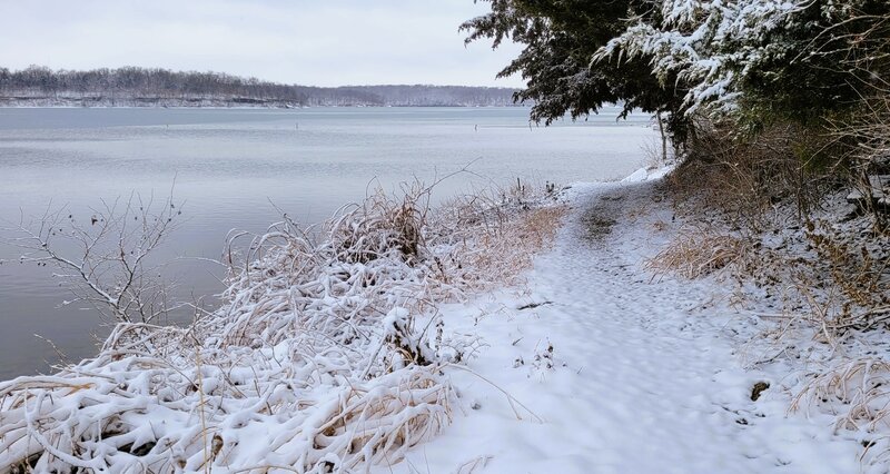 Shoreline portion of trail with recent inch of snowfall.