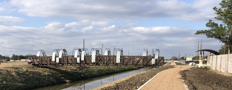 The Magnolia Park Bridge links the D132-00 and D132-01 trails and access to Petrovsky Elementary School.