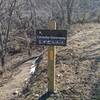 Catawba Greenway orange blaze and trail sign example.