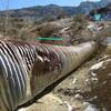 A rain storm moved this culvert into the canyon wash. Trail heads into the canyon to the left of this culvert.