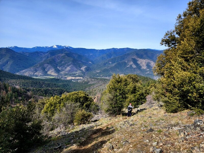 Descending the Charlie Buck Trail with Grayback Mountain on the horizon