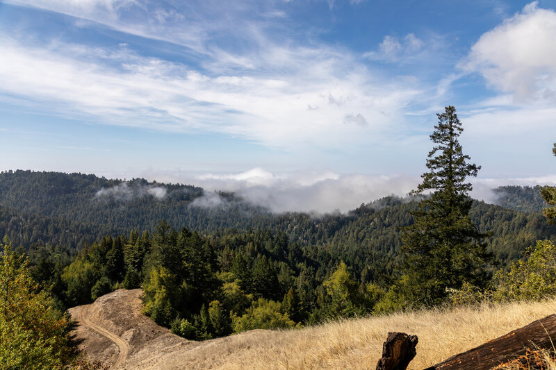 Clouds slowly moving over the mountain ridge