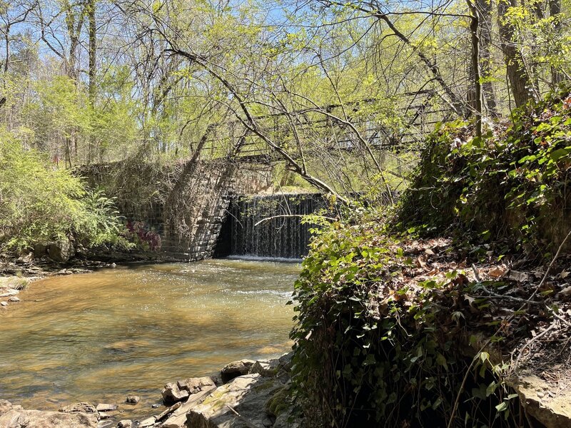 Dam built by Washington Jackson Houston and the remnants of a single-lane iron bridge that once carried traffic on Houston Mill Road across the Peachtree Creek