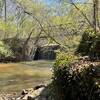 Dam built by Washington Jackson Houston and the remnants of a single-lane iron bridge that once carried traffic on Houston Mill Road across the Peachtree Creek