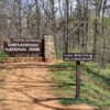 Trailhead to the Greenway Trail. There are no identifying signs. There is a concrete post on the Browntown Rd side of the trail.