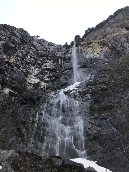 Snoquera Falls, a tall, low-flow, double drop waterfall.