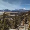 Nearest mountains - Mount Anna Mills, 12,054 ft. (center right), and Mt. Goyot, 12,300 ft. (center left, gray face). Far distance are mountains of the Great Western Divide. Seen looking west-northwest from the PCT high on the Siberian Outpost ridge.