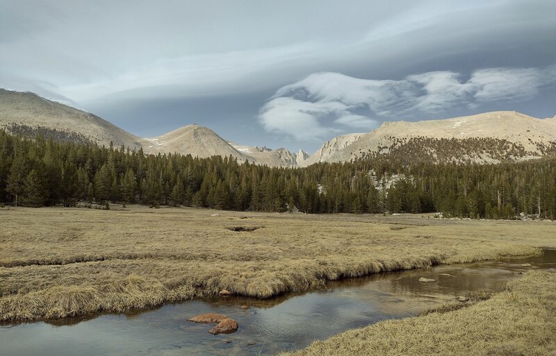 Mt. Whitney, 14,494 ft. (center), is seen in the distance to the east-northeast, from Crabtree Meadows.