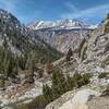 Looking southwest down the Wallace Creek valley from the trail (right) cut into the rock, there are dramatic views of Red Spur rising above the 3,000 foot cliffs of Kern Canyon ahead.