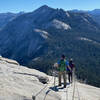 Descending the Half Dome cables. Clouds Rest is in the distance.