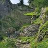 Super steep stone switchbacks to descend a cliff area.