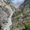 Can you spot the debris-covered snout of the glacier far up in the valley?