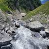 Lots of water rushing down this ravine - hikers will be thankful for the footbridge!