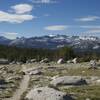 Views of the Cathedral Range can be enjoyed as you approach the tree line.   The trail is sandy through this area, but the views make it all worth it.