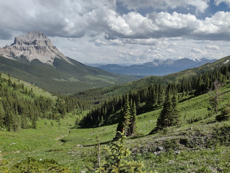 Crowsnest Mountain is on the left.  The valley of Crowsnest Pass stretches into the distance looking southeast at the foot of the Great Divide.