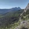 Seven Sisters and Crowsnest Mountain in the distance looking southeast from the trail just east of Racehorse Pass.