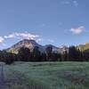 Meadows and mountains along West Castle Valley Trail in the early morning looking south.