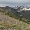 On the west side of Peak #5, looking southeast is Sunkist Ridge (left) and peaks into the distance. If going SOBO (heading east) do not veer off onto Sunkist Ridge, continue straight/east on the ridge towards Peak #4 and La Coulotte Peak.