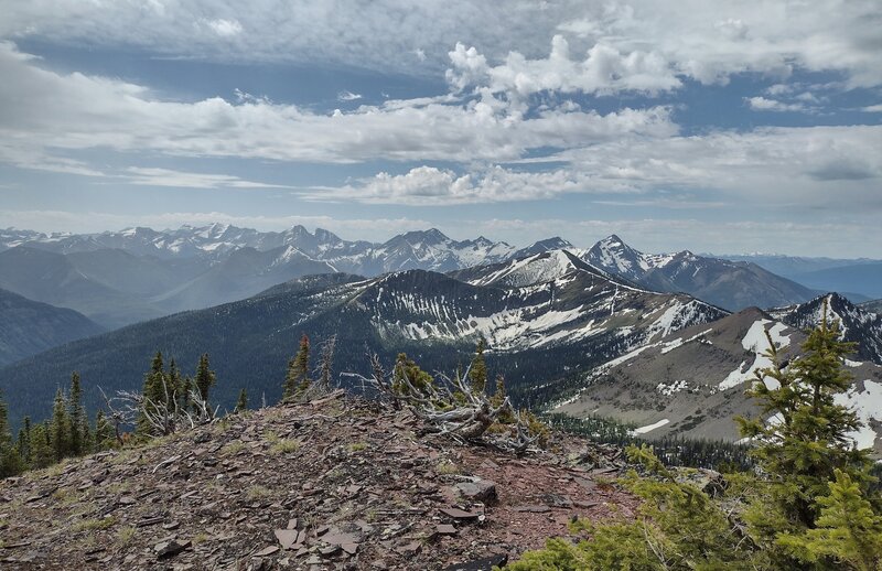 Looking south from the summit of Peak #4 (La Coulotte Ridge, next peak west of La Coulotte Peak):  Deep valleys and rugged, snowy peaks stretch into the distance forever.