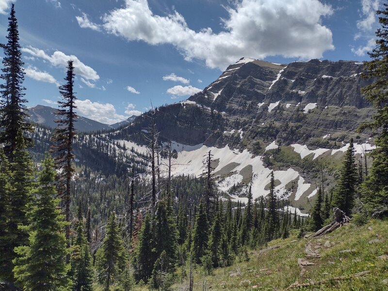 Upper Twin Lake is at the base of this rock wall with the Great Divide running along the wall's ridge top.