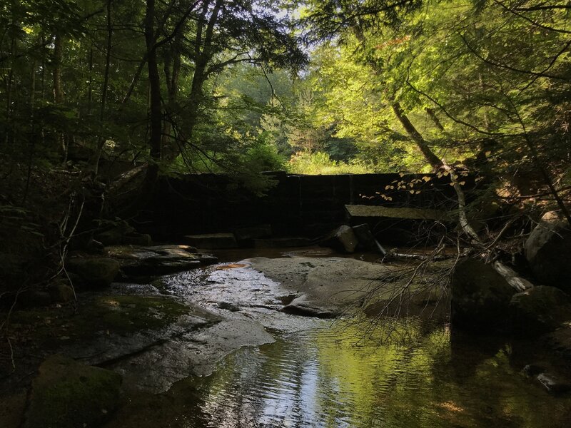 Old granite dam along Bartlett Brook.