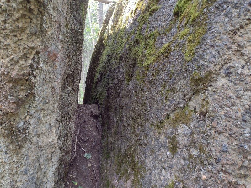 Examining the inside of Split Rock's split.