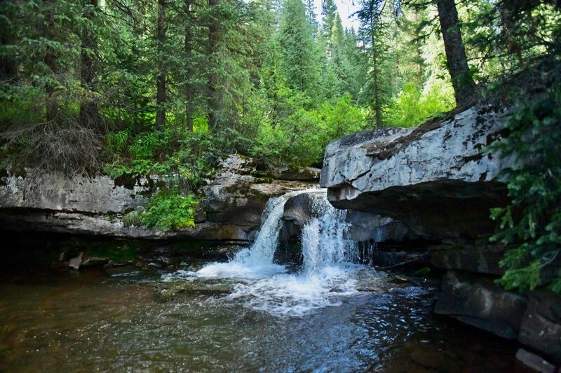 Waterfall with wading area.