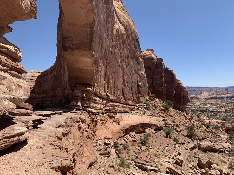 Under Jeep arch.