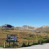 Taken from the Independence Pass parking area. Igloo Peak is in between the first two orange posts, and the trail can be traced along the ridge to the right. The beginning of the paved Overlook path can be seen bottom left.