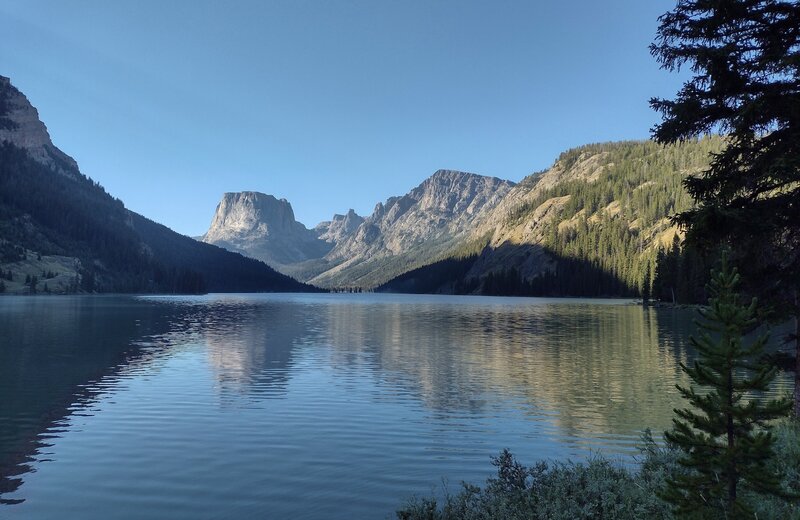 Upper Green River Lake as seen from its north end in the morning. Squaretop Mountain, 11,695 ft., is in the distance left-center.