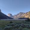 Early morning on the trail at the north end of Upper Green River Lake. Squaretop Mountain is in the distance left of center.