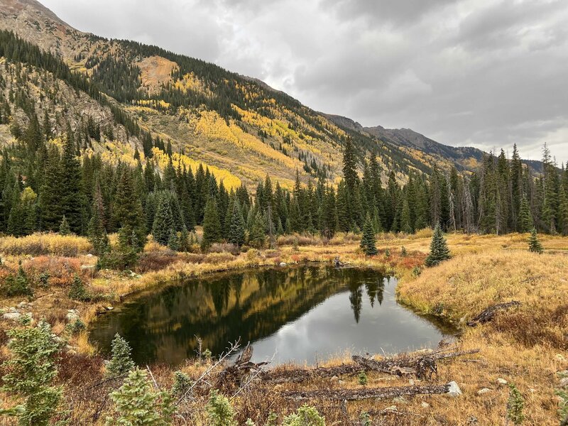 A lake along the Conundrum Out-And-Back Trail in Autumn.