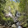 Where two separate streams--Curtis Creek and York Creek--join at the base of the falls to form Smith Creek, which flows into Unicoi Lake.