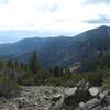 8,111 feet elevation; Panoramic view from overlook (N39° 22.006' W119° 53.167'); Cloud shrouded Mt Rose in the background. Washoe Lake in the background.