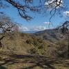 Looking northeast on the Mayfair Ranch Trail ridge top, nearby are the rugged hills of open space county parks.  In the far distance the Diablo Range can be seen.