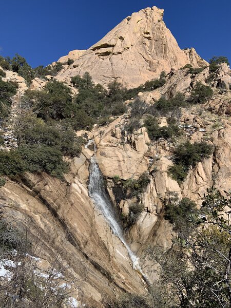 Waterfall Dome with a snowmelt waterfall near the end of the approach trail.