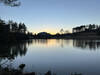 Evening view of Hampton Lake from the Lakeside Trail with Whiteside Mountain in the background.