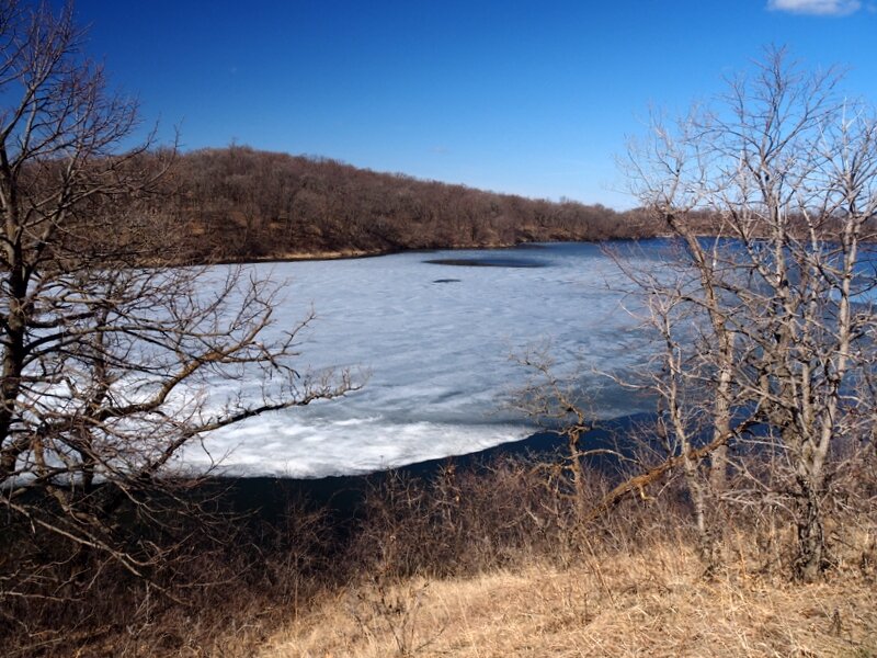 Signalness Lake still with some ice cover in early spring.