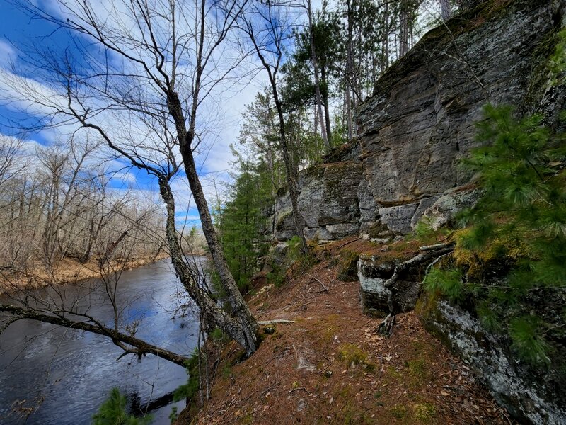 The sandstone cliffs from below.