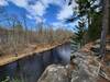 The sandstone cliffs from above along a channel of the St. Croix River.