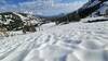 Looking down at a frozen Castle Lake with Black Butte in the distance.