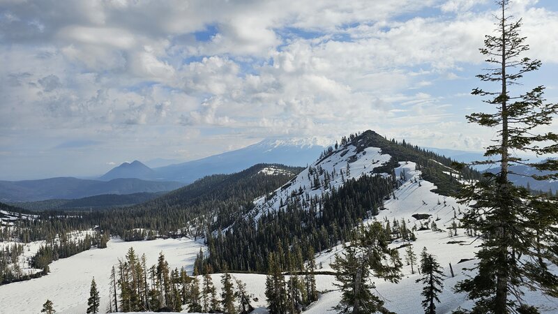 Looking at a cloud covered Mt Shasta and Black Butte from near Heart Lake.