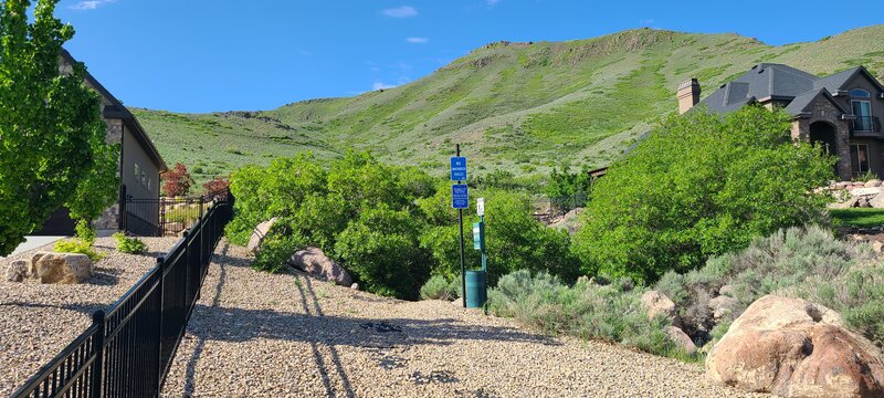 This is where the trail starts.  Go up in between the trees.