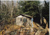 West Ridge Trail Log Cabin in the woods.