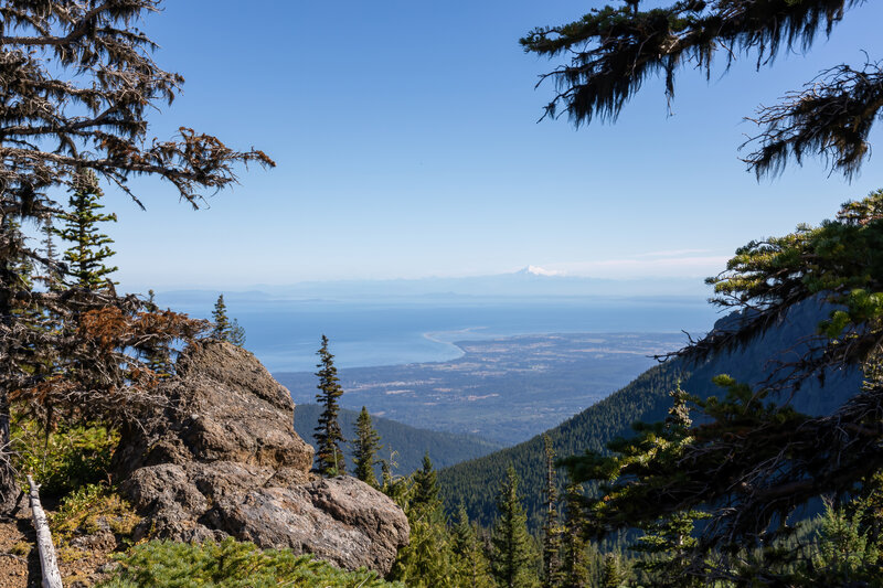 A glimpse of the Salish Sea and Mount Rainier.