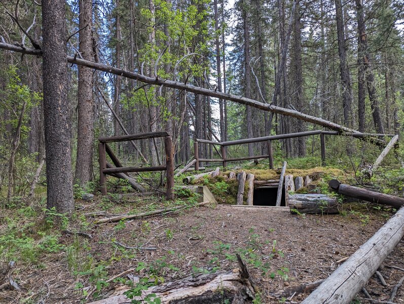 Dug-out shelter.