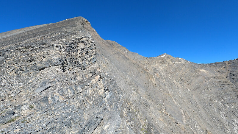 Taken from the top of the saddle.  Summit is on the far right with snow below it.