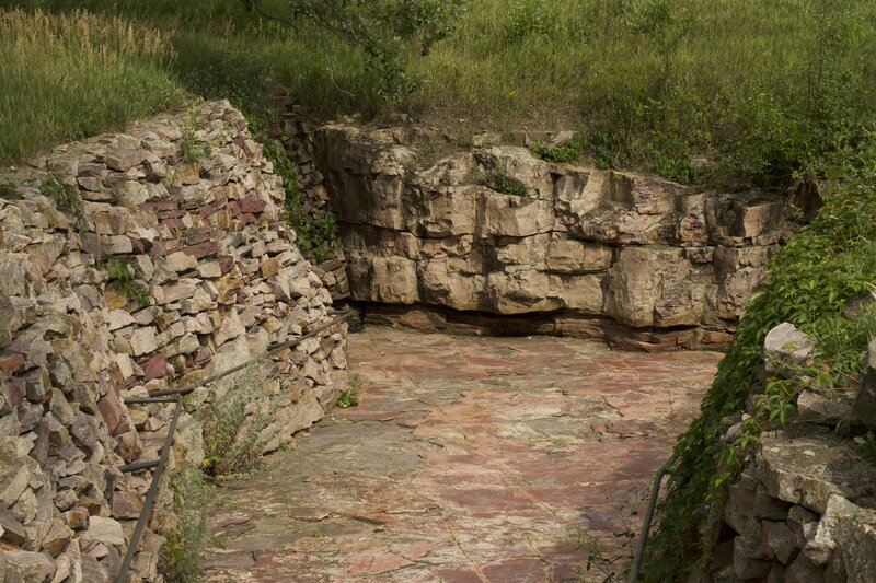 Example Pipestone Quarry where you can see the various levels of rock that need to be broken through in order to get to the pipestone.